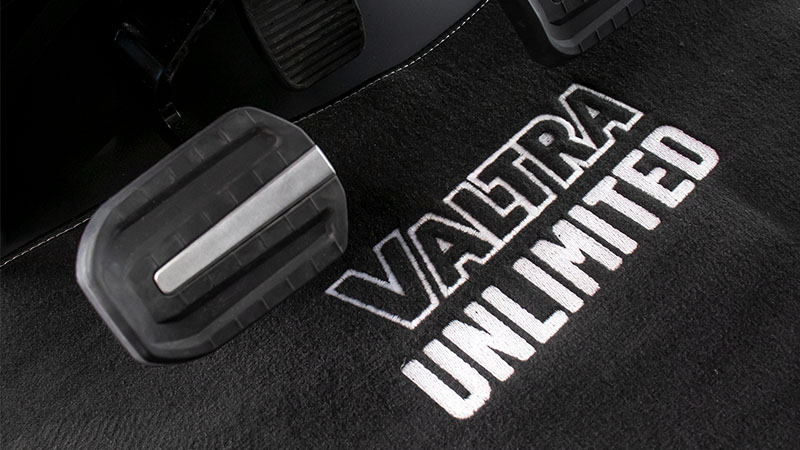 The Valtra Unlimited floor mat with Valtra Unlimited logo