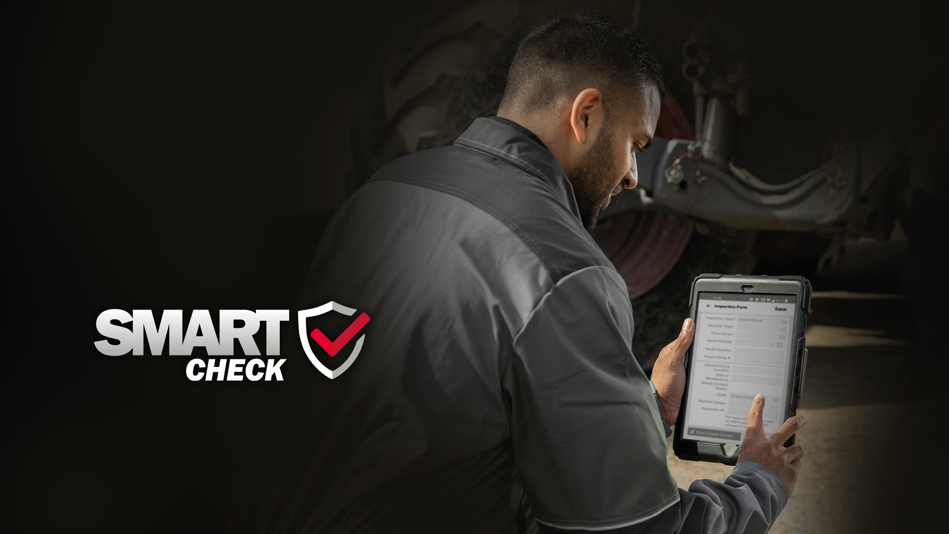 A technician checking a clipboard with the SMART Check logo