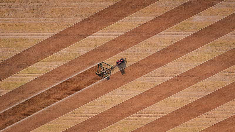 A Valtra tractor undertaking fieldwork