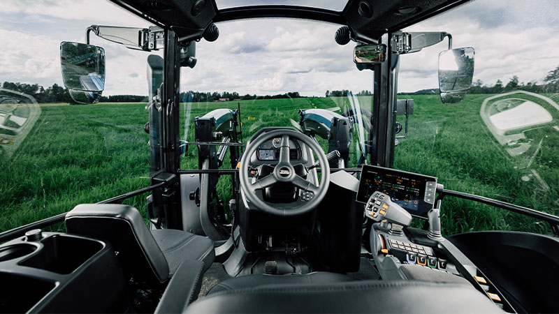 Plenty of glass ensures great visibility from the cab of a Valtra G135 tractor