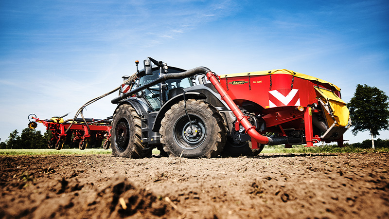 A Valtra Q305 tractor fitted with Valtra's Central Tyre Inflation System seed drilling using a Seed drill by Väderstad